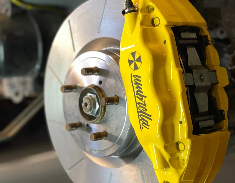 Subaru Impreza STI - Bremssattel SET für 4-Kolben Bremsanlage
